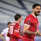 Aleksandar Mitrovic celebrates after scoring Serbia's second goal.