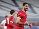 Aleksandar Mitrovic celebrates after scoring Serbia's second goal.
