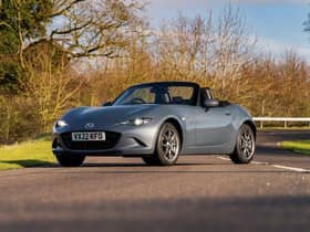 The Mazda MX-5 looks stunning with the roof down.