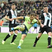 Ryan Fraser of AFC Bournemouth shoots during the Premier League match between Newcastle United and AFC Bournemouth  at St. James Park on November 09, 2019 in Newcastle upon Tyne, United Kingdom.
