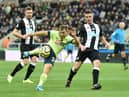 Ryan Fraser of AFC Bournemouth shoots during the Premier League match between Newcastle United and AFC Bournemouth  at St. James Park on November 09, 2019 in Newcastle upon Tyne, United Kingdom.