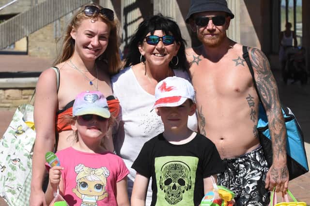 Amy Dwyer, Jackie Twinn, and Carl Twinn with Marni and Kobie.