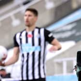 A TV cameraman films during the Premier League match between Newcastle United and Everton.