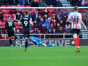Connor Wickham scores for MK Dons