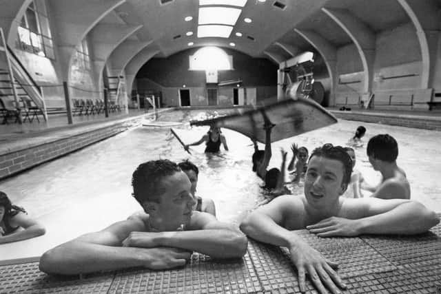 The 1993 photo which got the huge response. It shows Karl Peacock and Ian Gardener taking a rest as youngsters enjoy their last day at Derby Street  baths.