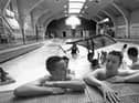 The 1993 photo which got the huge response. It shows Karl Peacock and Ian Gardener taking a rest as youngsters enjoy their last day at Derby Street  baths.