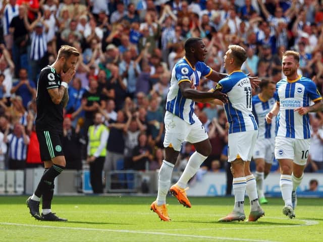 Moises Caicedo of Brighton & Hove Albion celebrates with Leandro Trossard after scoring their sides second goal during the Premier League match between Brighton & Hove Albion and Leicester City at American Express Community Stadium on September 04, 2022 in Brighton, England. (Photo by Bryn Lennon/Getty Images)