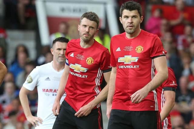 Michael Carrick and Graeme Carrick of Manchester United '08 XI in action during the Michael Carrick Testimonial match between Manchester United '08 XI and Michael Carrick All-Stars at Old Trafford on June 4, 2017 in Manchester, England.  (Photo by Matthew Peters/Manchester United via Getty Images)