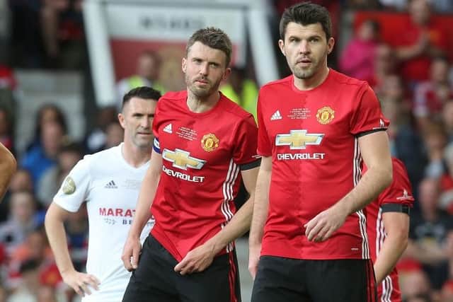 Michael Carrick and Graeme Carrick of Manchester United '08 XI in action during the Michael Carrick Testimonial match between Manchester United '08 XI and Michael Carrick All-Stars at Old Trafford on June 4, 2017 in Manchester, England. (Photo by Matthew Peters/Manchester United via Getty Images)