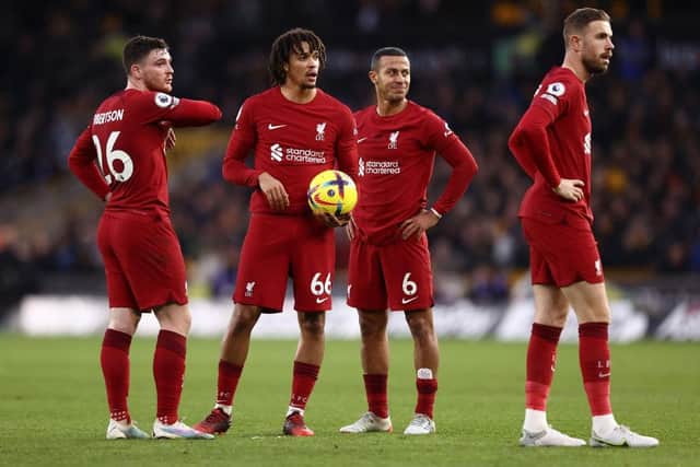 Trent Alexander-Arnold of Liverpool looks on with his team mates during the Premier League match between Wolverhampton Wanderers and Liverpool FC at Molineux on February 04, 2023 in Wolverhampton, England. (Photo by Naomi Baker/Getty Images)