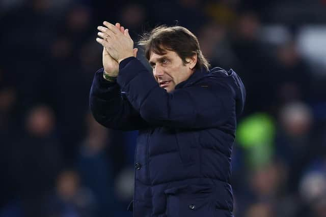 Antonio Conte, Manager of Tottenham Hotspur applauds the fans following the Premier League match between Brighton & Hove Albion and Tottenham Hotspur at American Express Community Stadium on March 16, 2022 in Brighton, England. (Photo by Julian Finney/Getty Images)