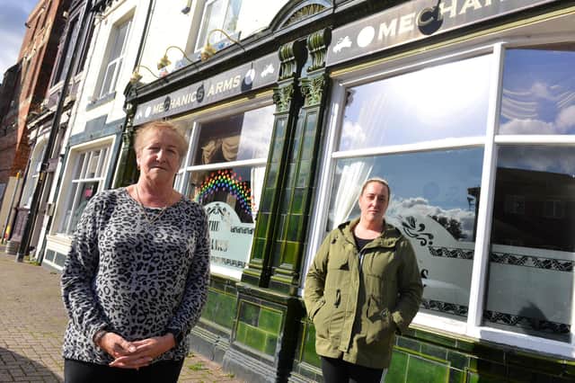 Mechanics Arms Gina Smith and Louise Carr (R)