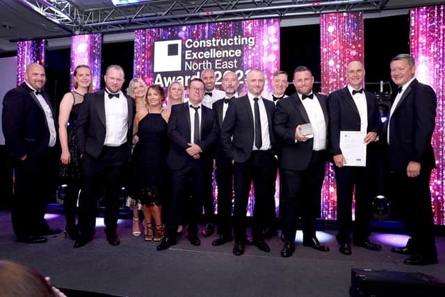 The Castle Building Services team with their excellence award.