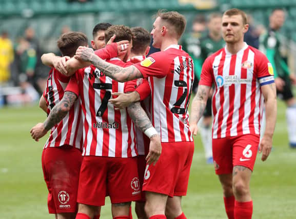 Sunderland players celebrate a goal.