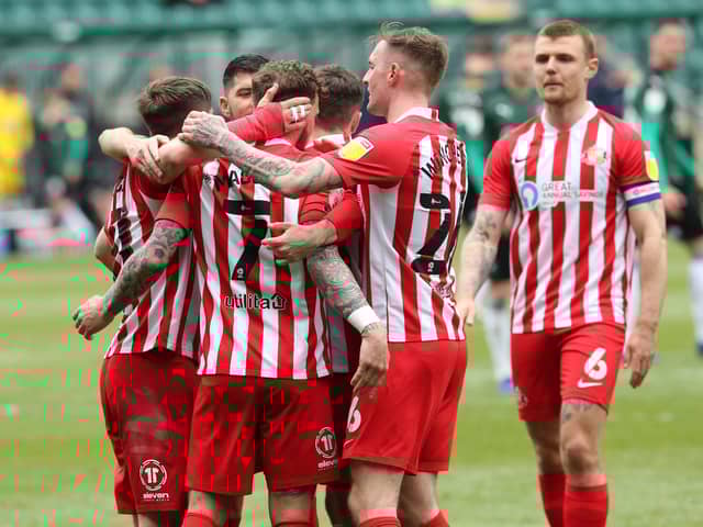 Sunderland players celebrate a goal.