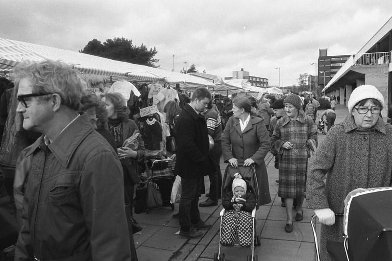 Wrapped up against the cold but these customers were still enjoying their day at Peterlee open market in November 1982.