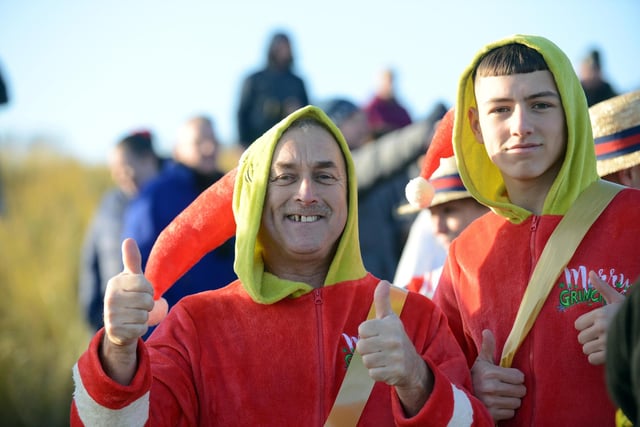 Fundraiser gives a thumbs up as he gets ready to face the ice cold temperatures of the North Sea