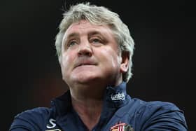 Steve Bruce of Sunderland watches from the touchline during the Barclays Premier League match between Manchester United and Sunderland at Old Trafford on November 5, 2011.