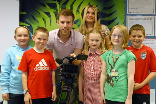 These students took part in filming for the children's TV programme Roar 14 years ago. Remember it?