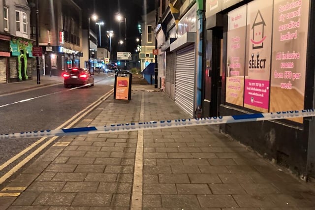 Police tape surrounds buildings in Sunderland city centre on Saturday evening after masonry fell to the ground.