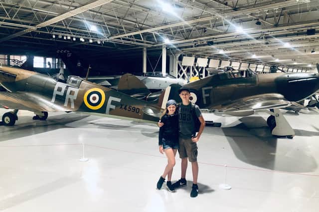 Xawery Wisniewski and sister Zara, 9, with the Hurricane at the RAF Museum in London.