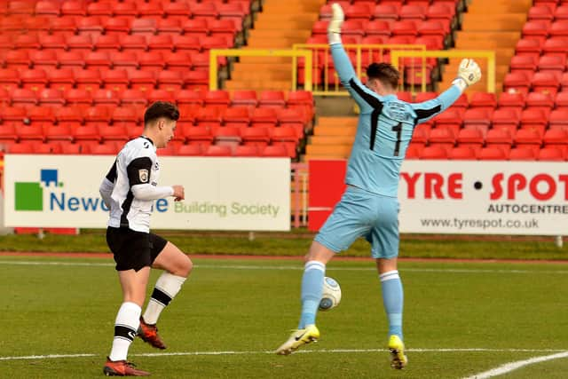 Lewis McNall scoring against Maidstone during his loan spell at Gateshead.