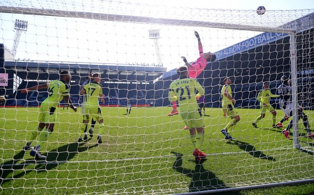 Martin Dubravka of Newcastle United tips a shot over the bar during the Premier League match between West Bromwich Albion and Newcastle United at The Hawthorns on March 07, 2021 in West Bromwich, England. Sporting stadiums around the UK remain under strict restrictions due to the Coronavirus Pandemic as Government social distancing laws prohibit fans inside venues resulting in games being played behind closed doors. (Photo by Gareth Copley/Getty Images)