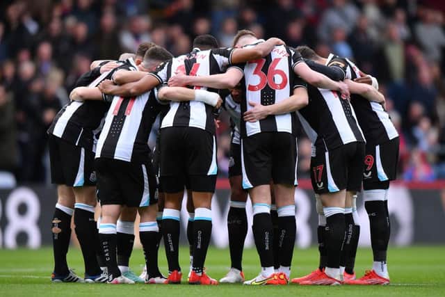LONDON, Newcastle United players huddle ahead of the Premier League match against Crystal Palace.