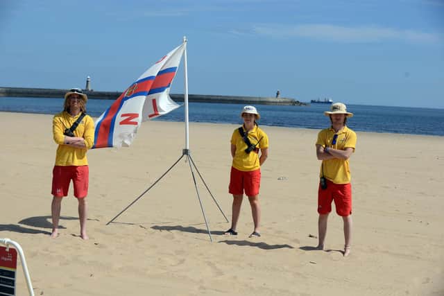 RNLI lifeguards from left Barns Teasdale, Lara Greggs and Lucas Johnson.