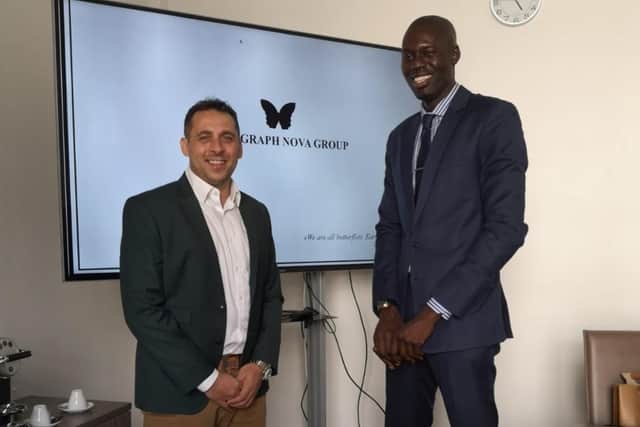 Michael Chopra, left, with Badara Ndiaye at the BN Group's Paris headquarters.