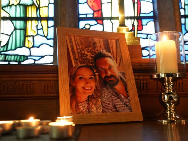 Candles are lit around a photo of Nicola Bulley (left) and her partner Paul Ansell on an altar at St Michael's Church in St Michael's on Wyre, Lancashire, as police continue their search for the missing mother of two.