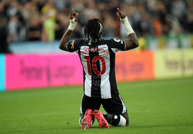 NEWCASTLE UPON TYNE, ENGLAND - SEPTEMBER 17: Allan Saint-Maximin of Newcastle United celebrates after scoring their team's first goal during the Premier League match between Newcastle United and Leeds United at St. James Park on September 17, 2021 in Newcastle upon Tyne, England. (Photo by Ian MacNicol/Getty Images)