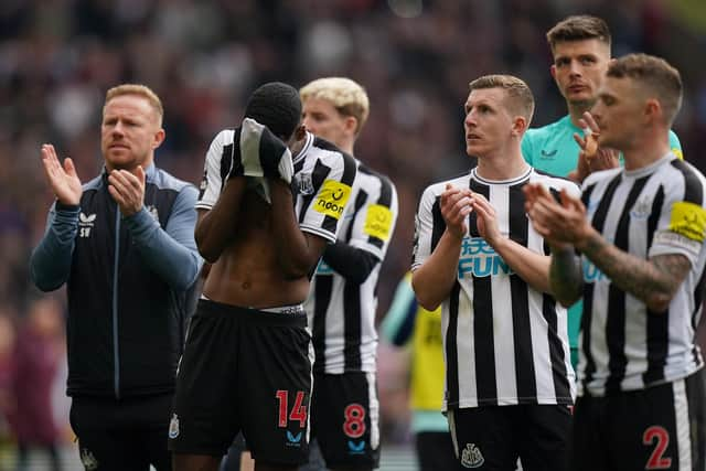 Newcastle United players after the final whistle at Villa Park.