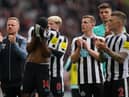 Newcastle United players after the final whistle at Villa Park.