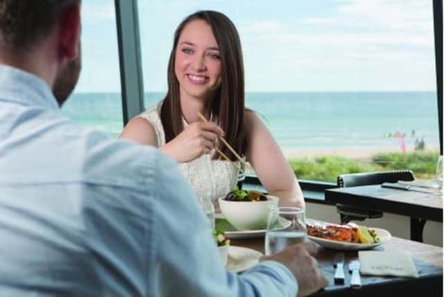 Couple eating in South Tyneside and enjoying the food on offer.