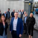 Paul Smith and Wendy Duffy with the new employee shareholders at HLA Group.