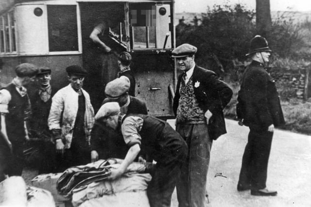 Loading the bus with blankets at Mansfield.