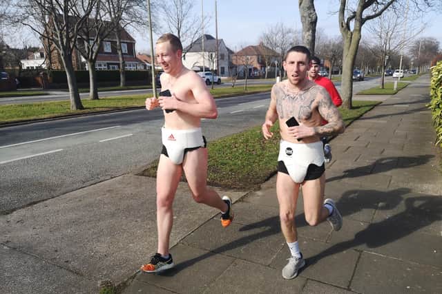 Ewan MacKenzie (left) and Robbie Coleman provided quite a sight as they pounded the streets of Jarrow.