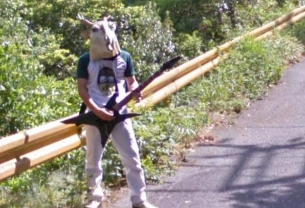 Perhaps a long lost cousin of Mr Frog in Prague, here’s Goatman jamming out on the guitar on the roads of Japan.