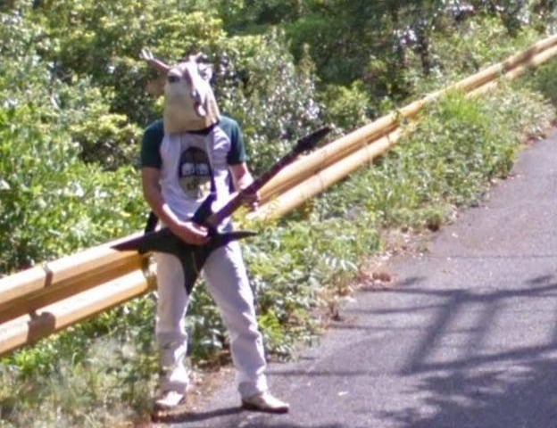 Perhaps a long lost cousin of Mr Frog in Prague, here’s Goatman jamming out on the guitar on the roads of Japan.