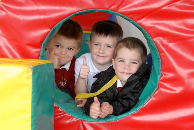 Having fun at playtime. Do you recognise the pupils in the picture?