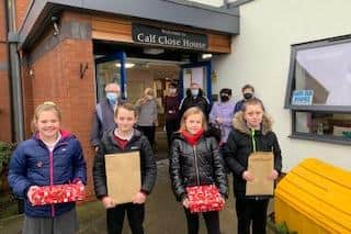 Pupils from Valley View and Hedworthfield Primary Schools created Christmas hearts to bring cheer to Calf Close House. Picture by Cathryn Henderson.