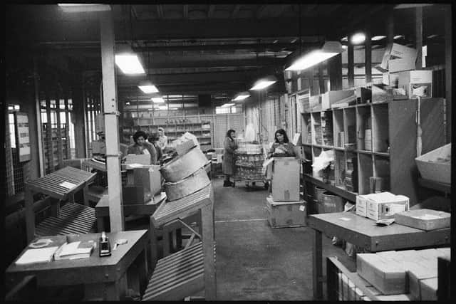 Women working on the production of glass bottles in the Wear Flint Glass Works, Sunderland in 1961. © Historic England Archive.