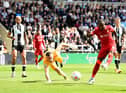 Naby Keita of Liverpool scoring the opening goal during the Premier League match between Newcastle United and Liverpool at St. James Park on April 30, 2022 in Newcastle upon Tyne, England. (Photo by Andrew Powell/Liverpool FC via Getty Images)