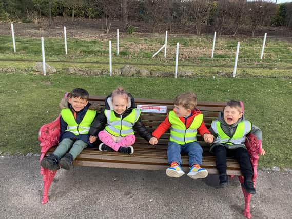 Youngsters at Nurserytime take a break from spreading some joy.