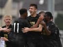 LIMAVADY, NORTHERN IRELAND - JULY 26: Oisin McEntee (C) of Newcastle United celebrates with team mates after opening the scoring with a header during the Super Cup NI u18 tournament group game between Newcastle United u18's and Komazawa University FC u18's at Scroggy Road on July 26, 2017 in Limavady, Northern Ireland. (Photo by Charles McQuillan/Getty Images)