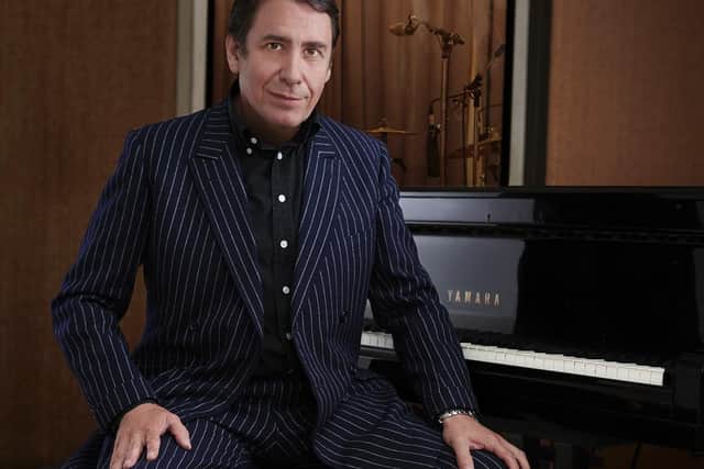Jools Holland. See question 27.