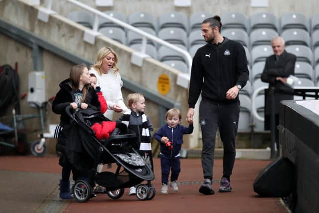 Andy Carroll with partner Billi Mucklow at St James's Park.