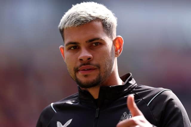 Bruno Guimaraes of Newcastle United looks on during warm up prior to  the Premier League match between Brentford FC and Newcastle United at Brentford Community Stadium on April 08, 2023 in Brentford, England. (Photo by Alex Pantling/Getty Images)