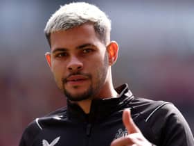 Bruno Guimaraes of Newcastle United looks on during warm up prior to  the Premier League match between Brentford FC and Newcastle United at Brentford Community Stadium on April 08, 2023 in Brentford, England. (Photo by Alex Pantling/Getty Images)